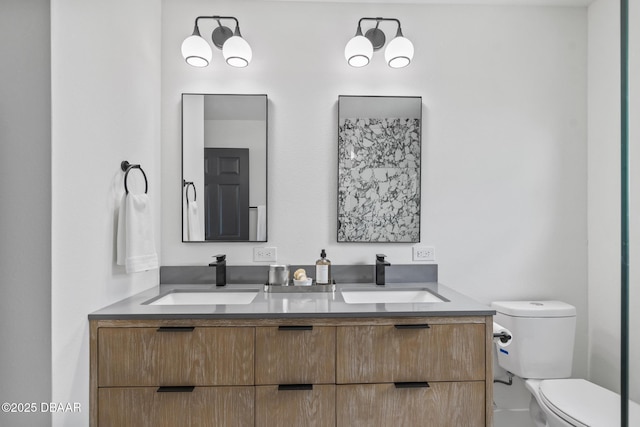 bathroom with vanity and toilet