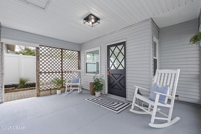 doorway to property with covered porch