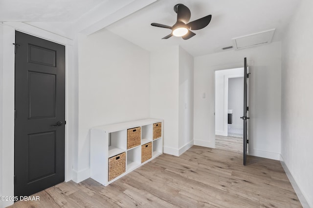 unfurnished room with vaulted ceiling, ceiling fan, and light wood-type flooring