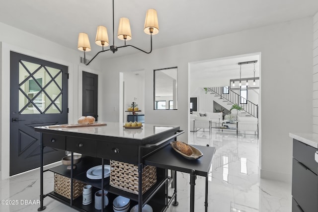 dining room with a notable chandelier