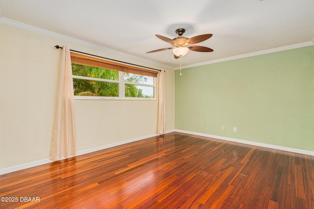 unfurnished room featuring ornamental molding, wood finished floors, a ceiling fan, and baseboards