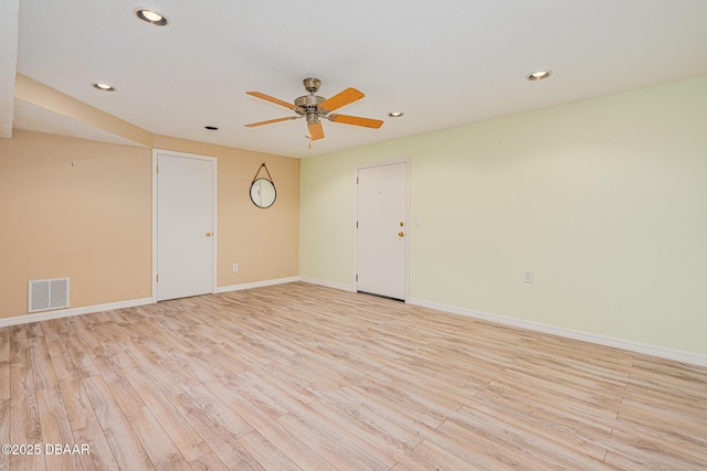 spare room featuring recessed lighting, a ceiling fan, baseboards, visible vents, and light wood-style floors