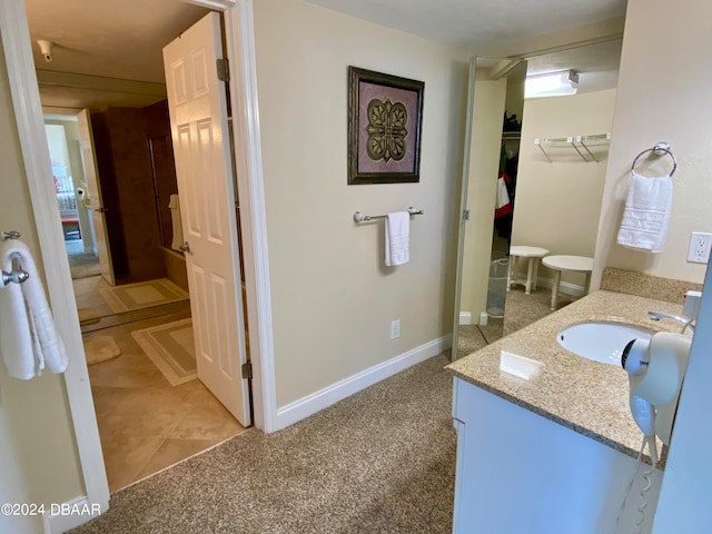 bathroom featuring vanity and tile patterned floors