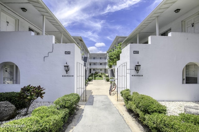 405 N Halifax Ave N Unit 208, Daytona Beach, FL 32118 - view of side of home with stucco siding