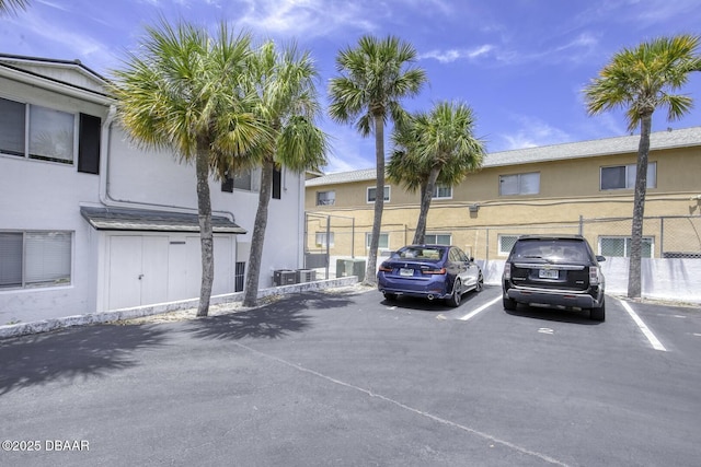 405 N Halifax Ave N Unit 208, Daytona Beach, FL 32118 - view of building exterior featuring uncovered parking