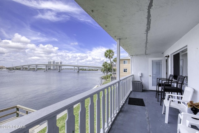 405 N Halifax Ave N Unit 208, Daytona Beach, FL 32118 - balcony featuring a water view and central AC unit