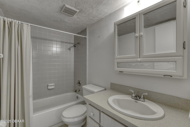 405 N Halifax Ave N Unit 208, Daytona Beach, FL 32118 - full bathroom with visible vents, shower / tub combo with curtain, vanity, toilet, and a textured ceiling