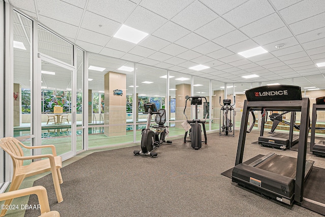 workout area featuring a drop ceiling