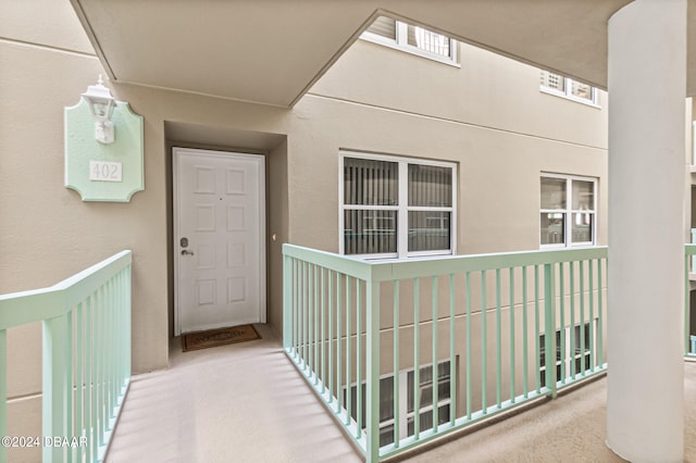 doorway to property featuring a balcony