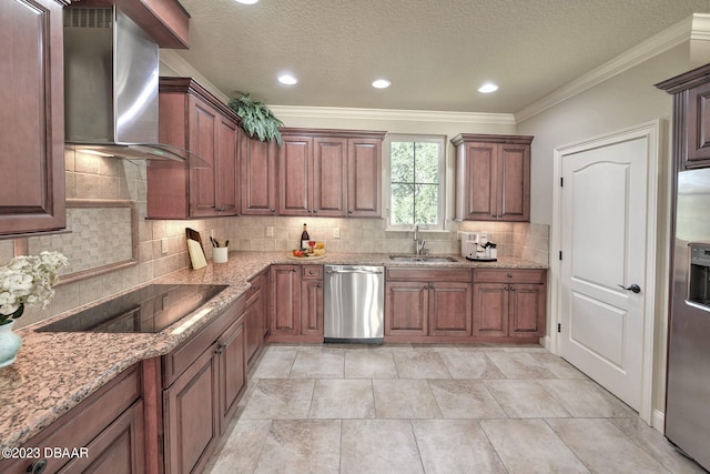 kitchen with stainless steel appliances, wall chimney exhaust hood, sink, tasteful backsplash, and crown molding