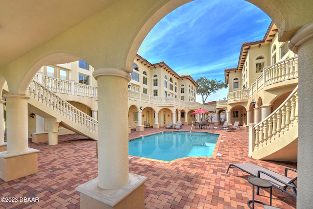 view of pool with a patio