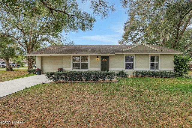 ranch-style home featuring an attached garage, driveway, roof with shingles, stucco siding, and a front lawn