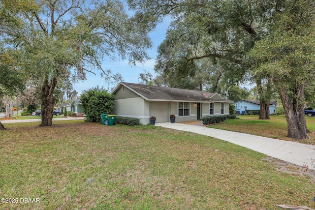 ranch-style home featuring driveway and a front lawn