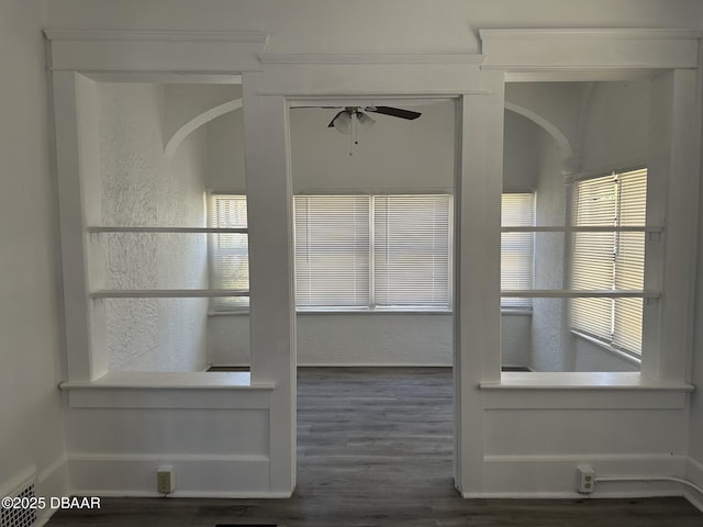 interior details featuring hardwood / wood-style floors and ceiling fan