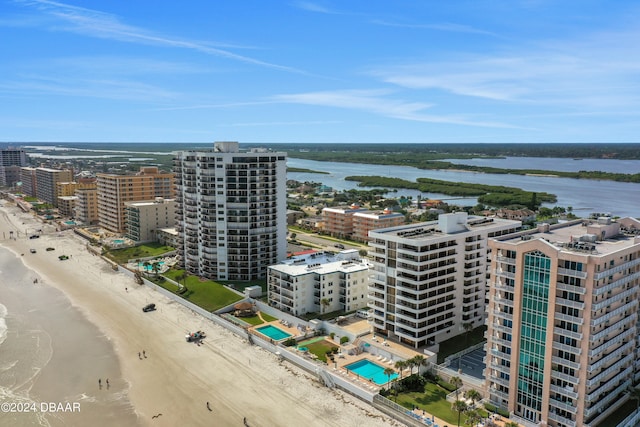 bird's eye view with a beach view and a water view