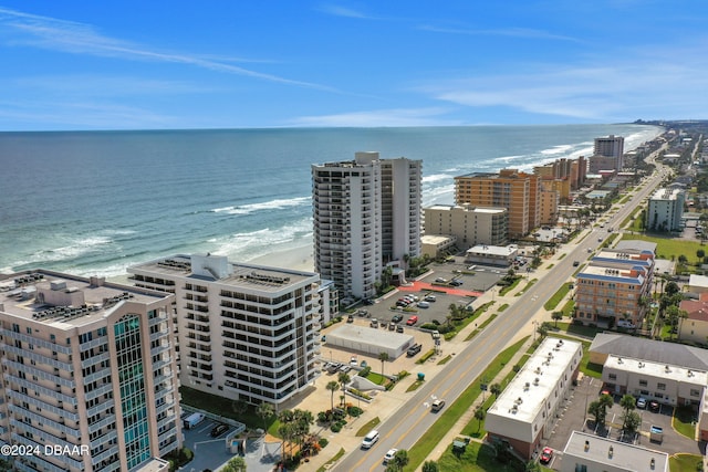 aerial view with a view of the beach and a water view