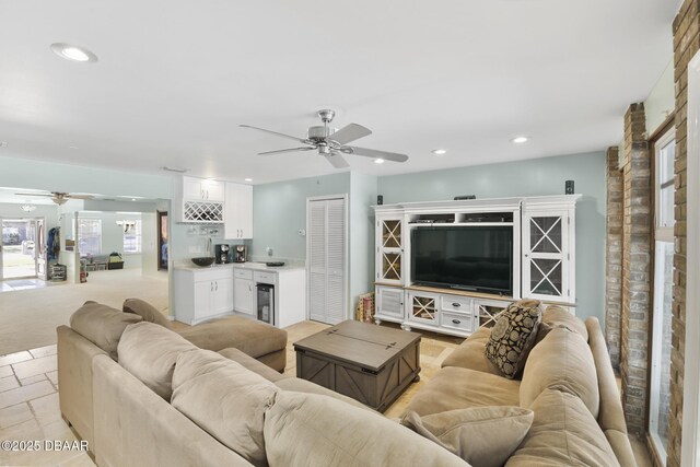 living area with wet bar, wine cooler, recessed lighting, and ceiling fan