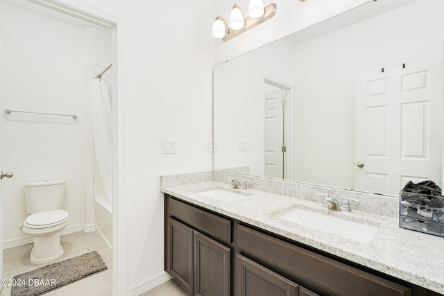 full bath featuring double vanity, a sink, shower / bath combination with curtain, and toilet