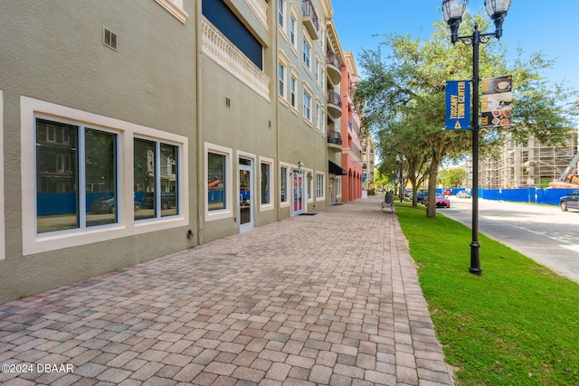 exterior space with street lights and sidewalks