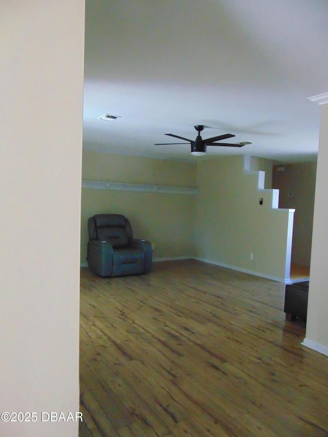 1500 Manor Dr, Daytona Beach, FL 32114 - spare room featuring wood finished floors, ceiling fan, and baseboards