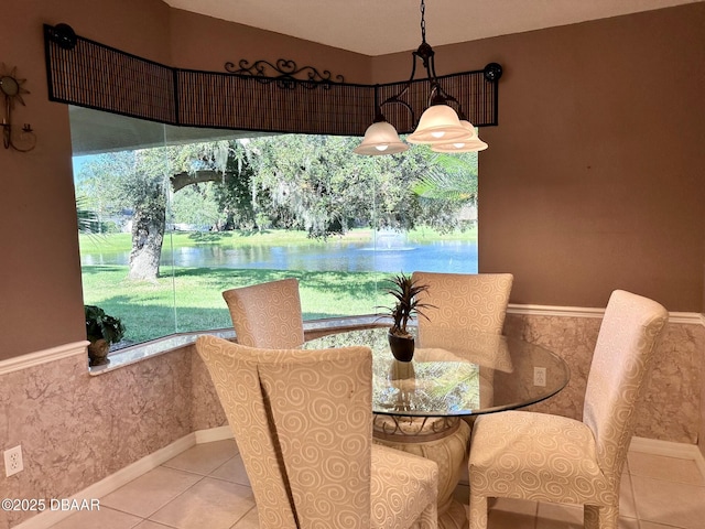 dining area with light tile patterned flooring