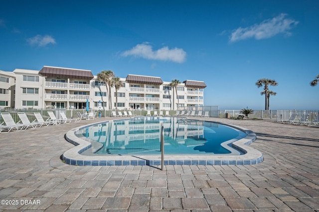 view of pool featuring a patio