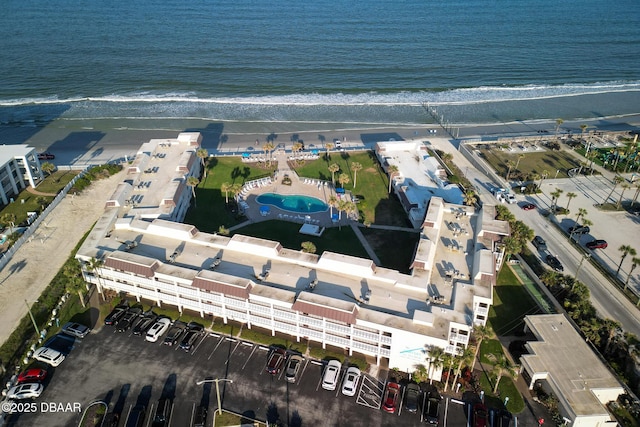 bird's eye view featuring a beach view and a water view