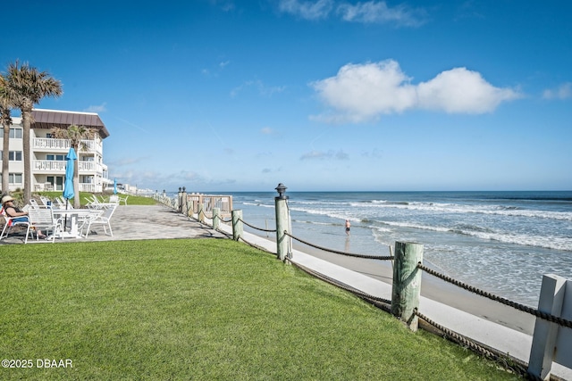 view of water feature with a beach view