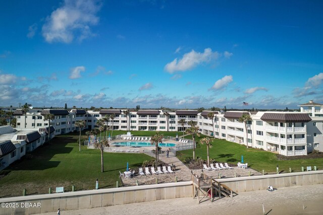 view of property with a community pool