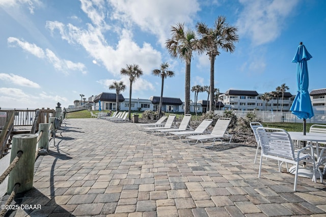 view of home's community with a patio