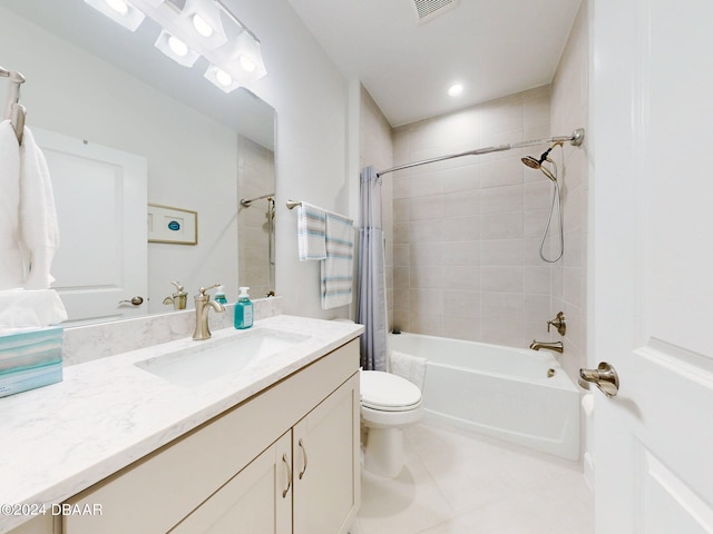 full bathroom featuring shower / tub combo with curtain, vanity, toilet, and tile patterned floors