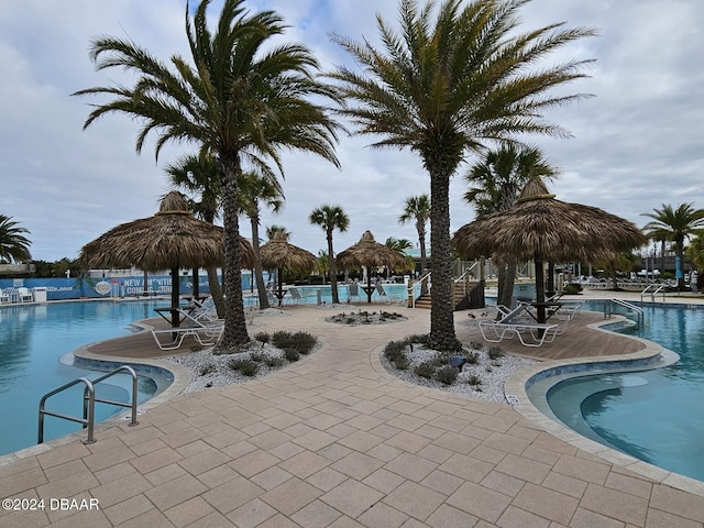 view of pool featuring a patio and a gazebo