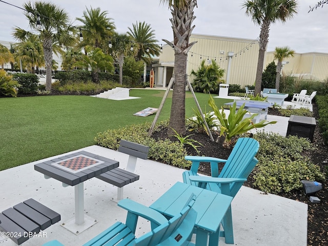 view of patio with a fire pit