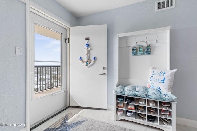 mudroom featuring light tile patterned floors