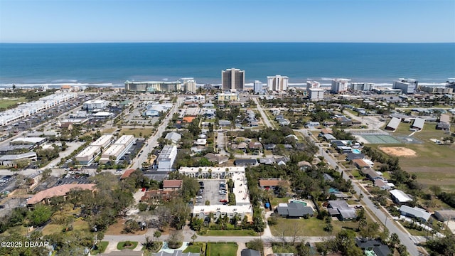 aerial view featuring a view of city and a water view