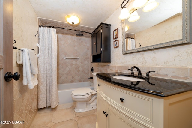 full bathroom with tile patterned flooring, shower / bath combination with curtain, toilet, and vanity