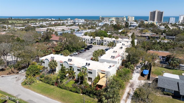 aerial view featuring a view of city and a water view