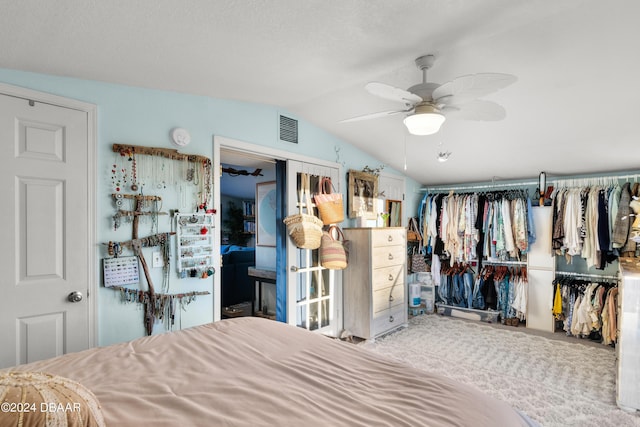 unfurnished bedroom with a closet, vaulted ceiling, and ceiling fan