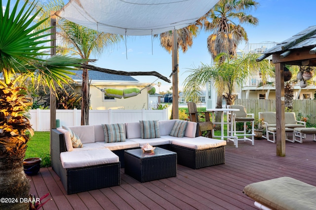 wooden terrace featuring an outdoor hangout area