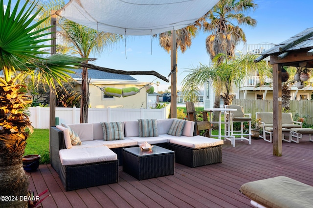 wooden deck featuring an outdoor hangout area