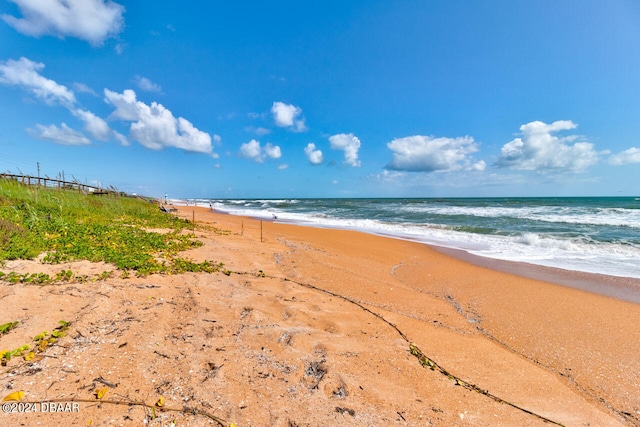 property view of water featuring a beach view