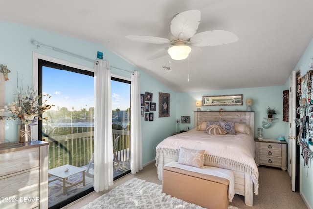 carpeted bedroom featuring ceiling fan, access to outside, and vaulted ceiling