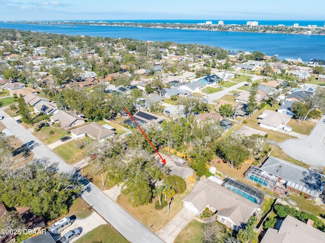 drone / aerial view featuring a water view