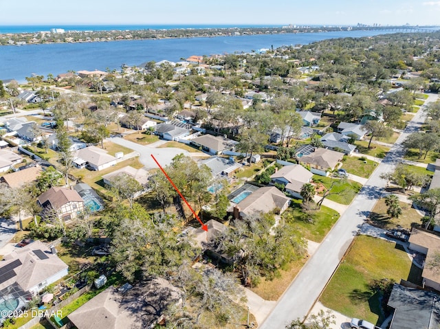 bird's eye view with a water view