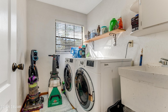 laundry room featuring sink and washing machine and dryer