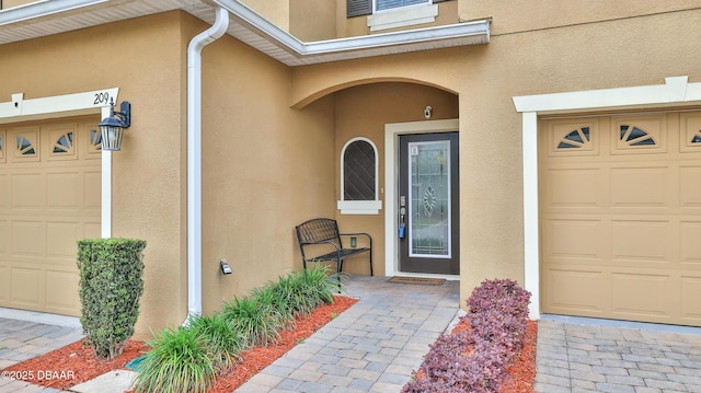 property entrance featuring a garage