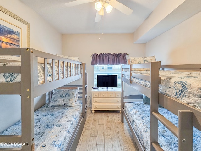 bedroom featuring ceiling fan and light wood-type flooring