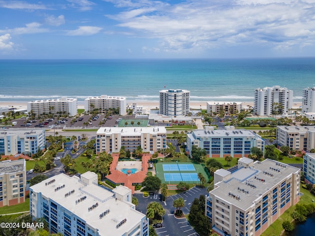 drone / aerial view with a view of the beach and a water view