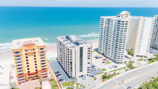 aerial view featuring a beach view and a water view