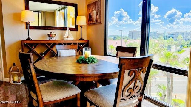 dining area with hardwood / wood-style flooring